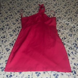 Medium pink dress NWT never worn. goes around neck and fastens